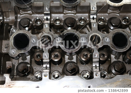 Service of car engine cylinder head. Service of car engine cylinder head. 138642899