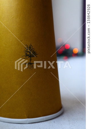 The image of a withered tree on a paper cup. The image of a withered tree on a paper cup. 138642926