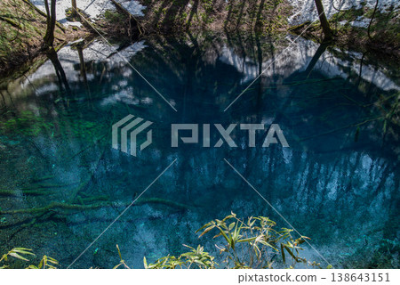 The mystical blue pond in early spring The mystical blue pond in early spring 138643151