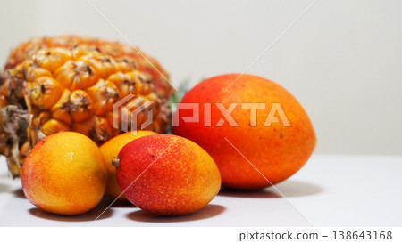 Vibrantly colored Okinawan tropical fruits: Mango & Pineapple Vibrantly colored Okinawan tropical fruits: Mango & Pineapple 138643168