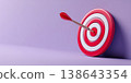 Hand holding a red target with an arrow hitting the center. Target audience, marketing strategy, customer focus, and human resources in business and innovation. Goal achievement. Aiming. Planning 138643354