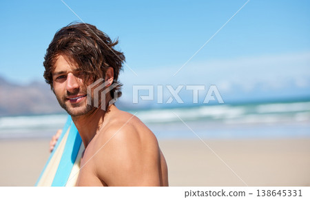 Beach portrait, surf and sports man on holiday, vacation or Spain getaway for nature, freedom or natural outdoor wellness. Surfboard, summer sunshine and face of relax surfer with coast mockup space Beach portrait, surf and sports man on holiday, vacation or Spain getaway for nature, freedom or natural outdoor wellness. Surfboard, summer sunshine and face of relax surfer with coast mockup space 138645331