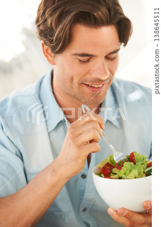 Man, salad and healthy food, diet and lunch with wellness, eating meal with smile and nutrition. Health, dinner and bowl in hands with lettuce and vegetables to lose weight, hungry and self care Man, salad and healthy food, diet and lunch with wellness, eating meal with smile and nutrition. Health, dinner and bowl in hands with lettuce and vegetables to lose weight, hungry and self care 138645511