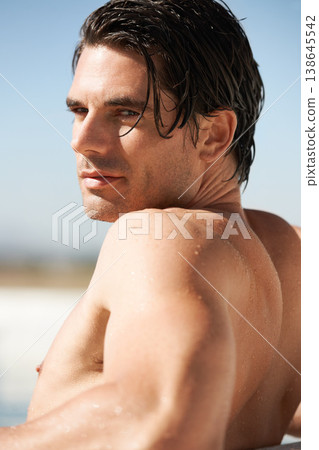Portrait, bare and outdoor with man, vacation and wet with getaway, weekend break and relax. Face, person and guy with travel, holiday and water with rest, tourist and pool with freedom and wellness 138645542