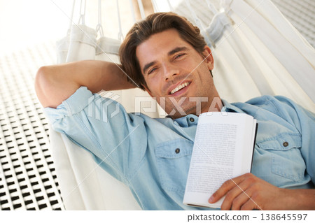 Man in hammock , portrait and smile, reading book and relax, vacation and learning with self care and time alone. Knowledge, literature and novel with happiness, cozy and comfort, leisure or hobby Man in hammock , portrait and smile, reading book and relax, vacation and learning with self care and time alone. Knowledge, literature and novel with happiness, cozy and comfort, leisure or hobby 138645597