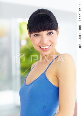 Happy, excited and portrait of woman in a home with good, confident and positive attitude. Smile, pride and young female model with optimistic or satisfaction face in living room in modern house. 138645628