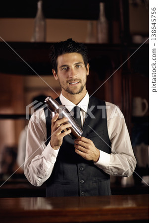 Cocktail, mixer and portrait of bartender with a drink for customer in dark club or night. Mixing, alcohol and face of barman with liquor in metal container to shake for a strong beverage in a bar 138645756