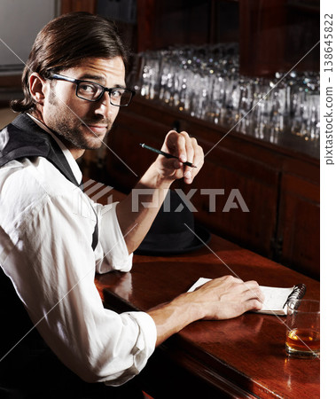 Portrait, writer and man with a notebook, whiskey and creativity with inspiration, journalist and glasses. Face, person and author with alcohol, ideas and writing in a tavern, poet and freelancer Portrait, writer and man with a notebook, whiskey and creativity with inspiration, journalist and glasses. Face, person and author with alcohol, ideas and writing in a tavern, poet and freelancer 138645822