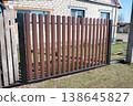Modern brown metal euro fence panels home garden w section palisade picket with vertical slats and black posts 138645827