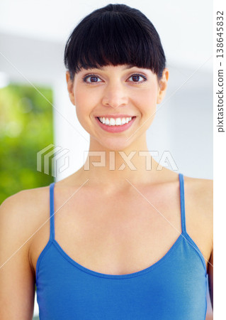 Happy, smile and portrait of woman in a home with positive, good or confident attitude. Excited, happiness and young female model with optimistic, satisfaction or pride face in a modern house. Happy, smile and portrait of woman in a home with positive, good or confident attitude. Excited, happiness and young female model with optimistic, satisfaction or pride face in a modern house. 138645832
