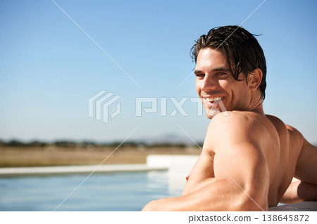 Portrait, infinity pool and happy man swimming outdoor for travel, freedom or summer holiday at resort. Relax, smile and face of male swimmer in nature for luxury getaway at villa, spa or hotel trip Portrait, infinity pool and happy man swimming outdoor for travel, freedom or summer holiday at resort. Relax, smile and face of male swimmer in nature for luxury getaway at villa, spa or hotel trip 138645872