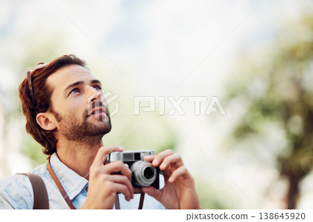 Photographer, camera or man on holiday, vacation or trip for a fun summer adventure in Italy looking up. Bokeh mockup space, tourist or person with sightseeing in nature journey or park for travel Photographer, camera or man on holiday, vacation or trip for a fun summer adventure in Italy looking up. Bokeh mockup space, tourist or person with sightseeing in nature journey or park for travel 138645920