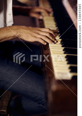 Jazz, hands or man with piano for music, performance or learning solo for entertainment or freedom. Closeup, pianist or creative musician playing keys on instrument or organ for artistic expression Jazz, hands or man with piano for music, performance or learning solo for entertainment or freedom. Closeup, pianist or creative musician playing keys on instrument or organ for artistic expression 138645985