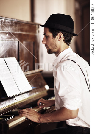 Piano, reading or man playing music, performance or entertainment with talent, art or freedom. Learning solo, pianist or creative musician with keys on instrument or organ with paper or notes Piano, reading or man playing music, performance or entertainment with talent, art or freedom. Learning solo, pianist or creative musician with keys on instrument or organ with paper or notes 138646039