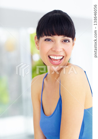 Happy, smile and portrait of woman in studio with joyful, cheerful and optimistic facial expression. Pride, happiness and young female model with satisfaction face in living room in a modern house. Happy, smile and portrait of woman in studio with joyful, cheerful and optimistic facial expression. Pride, happiness and young female model with satisfaction face in living room in a modern house. 138646056