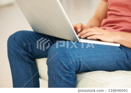 Hands, remote work and person on sofa with laptop for social media, elearning and online shopping. Closeup, freelancer and typing on computer keyboard for email, planning blog and research at home Hands, remote work and person on sofa with laptop for social media, elearning and online shopping. Closeup, freelancer and typing on computer keyboard for email, planning blog and research at home 138646091