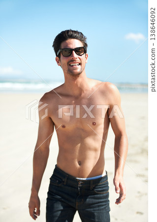 Summer, sunglasses and the body of a man on the beach for travel, freedom or adventure on vacation. Nature, sand and a young person shirtless by the ocean or sea on a tropical coast for holiday Summer, sunglasses and the body of a man on the beach for travel, freedom or adventure on vacation. Nature, sand and a young person shirtless by the ocean or sea on a tropical coast for holiday 138646092