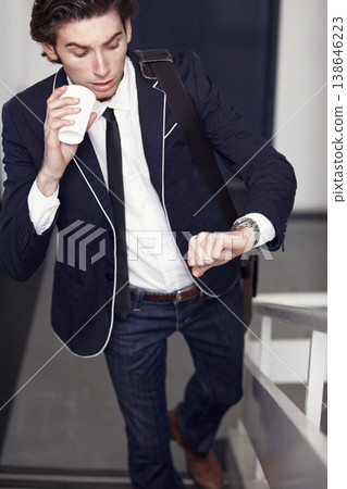 Coffee, fashion and young man by staircase with a watch checking the time for being late. Latte, walking and handsome male person with casual, formal and classy style for professional career. 138646223