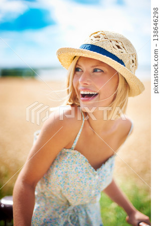 Funny woman on bicycle in the countryside, happiness and travel on journey or thinking outdoor. Smile, bike and excited person laughing at field on transport, freedom and cycling in nature in summer Funny woman on bicycle in the countryside, happiness and travel on journey or thinking outdoor. Smile, bike and excited person laughing at field on transport, freedom and cycling in nature in summer 138646298