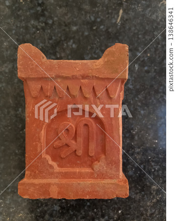 Indian traditional ( Clay pot ) pot known as tulsi vrindavan trishul Indian traditional ( Clay pot ) pot known as tulsi vrindavan trishul 138646341