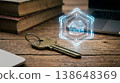 Physical Brass House Key and Glowing Digital Token 138648369