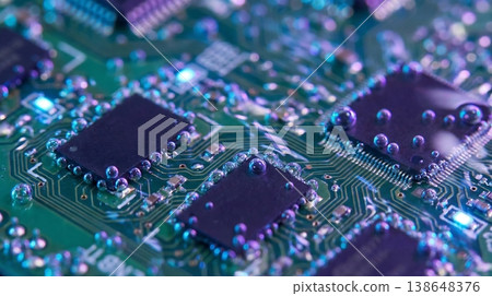 Abstract View of Computer Chips Submerged in Boiling Liquid Abstract View of Computer Chips Submerged in Boiling Liquid 138648376