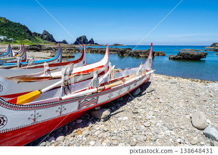 Lanyu, Taiwan - June 24, 2025: A traditional ceramic boat anchored at the shore Lanyu, Taiwan - June 24, 2025: A traditional ceramic boat anchored at the shore 138648431