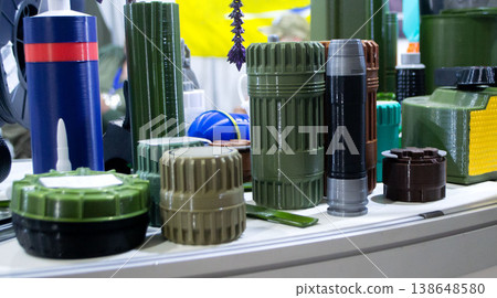 Various military-grade items printed on 3D printers. Prototype of ammunition mina petal, anti-tank, anti-personnel mines printed on 3D printer. Innovation new modern additive technologies. 3D printing 138648580