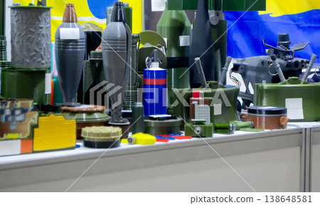 Various military-grade items printed on 3D printers. Prototype of ammunition mina petal, anti-tank, anti-personnel mines, high-explosive fragmentation mortar mines printed on 3D printer. 3D printing 138648581