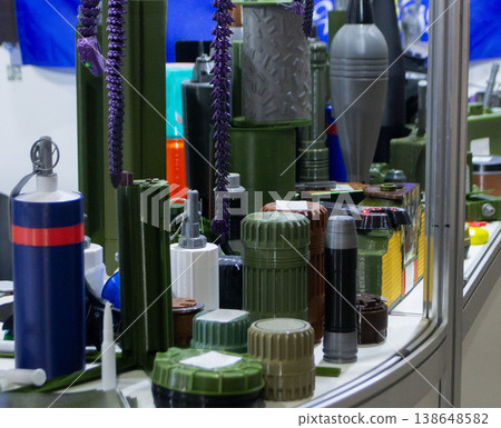 Various military-grade items printed on 3D printers. Prototype of ammunition mina petal, anti-tank, anti-personnel mines printed on 3D printer. Innovation new modern additive technologies. 3D printing 138648582