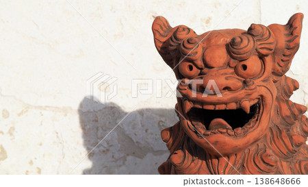 A close-up of a traditional Okinawan Shisa statue. A close-up of a traditional Okinawan Shisa statue. 138648666
