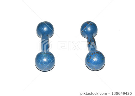 Old cast iron dumbbells. 138649420