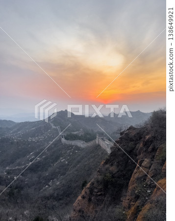 view of the Jinshanling section of the Great Wall of China during sunset 138649921