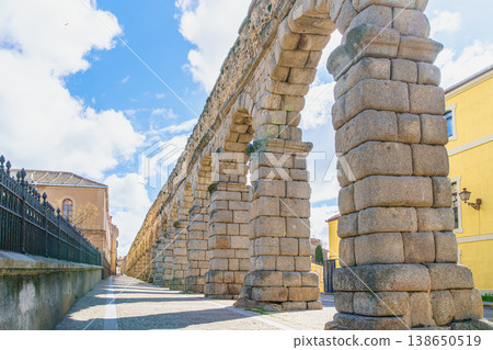 Roman Aqueduct of Segovia in Spain under Blue Sky 138650519