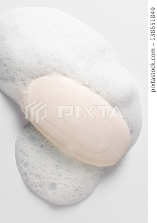 Soap with foam on a white background. Soap with foam on a white background. 138651849