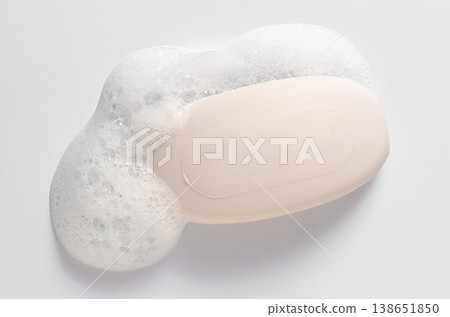 Soap with foam on a white background. Soap with foam on a white background. 138651850