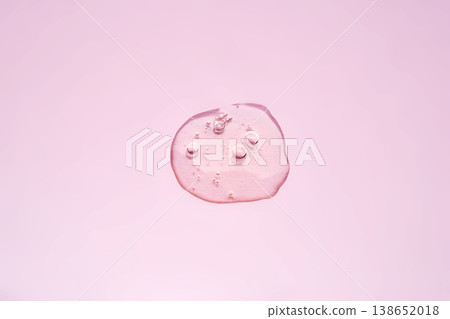 Pink cosmetic gel drop with hydrating bubbles Pink cosmetic gel drop with hydrating bubbles 138652018