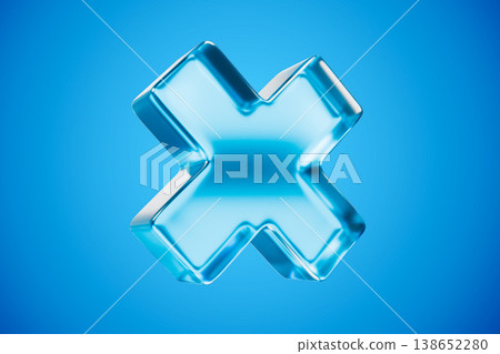 Blue glass X shaped cross floating in a blue studio Blue glass X shaped cross floating in a blue studio 138652280