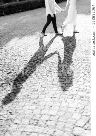 Photographic Representation Of Newlyweds In City Environment With Detailed Stone Flooring Photographic Representation Of Newlyweds In City Environment With Detailed Stone Flooring 138652364