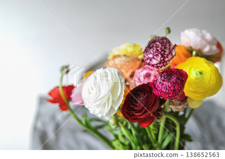 Colorful ranunculus bouquet for celebration gift and greeting concept. Colorful ranunculus bouquet for celebration gift and greeting concept. 138652563