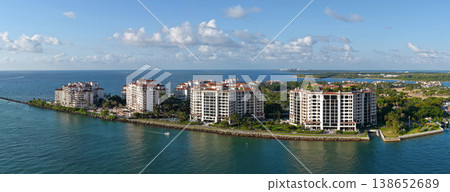 Panorama of Miami from above. Drone view of Miamis famous landmarks. South Pointe beach with skyscrapers. Miami city panorama. Oceanfront skyline of Miami Beach. Panorama of Miami from above. Drone view of Miamis famous landmarks. South Pointe beach with skyscrapers. Miami city panorama. Oceanfront skyline of Miami Beach. 138652689