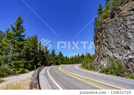 Landscape of rocky mountain and road. Travel destination. Landscape route to North Cascades National Park. Scenic nature. North Cascades nation park. Road leads to Diablo lake with mountain landscape Landscape of rocky mountain and road. Travel destination. Landscape route to North Cascades National Park. Scenic nature. North Cascades nation park. Road leads to Diablo lake with mountain landscape 138652720