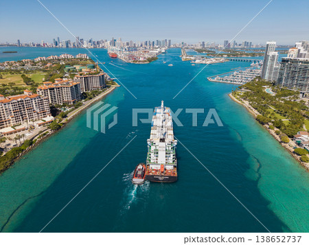 Miami, Florida, USA - March 20, 2025: Cargo Seaboard Explorer container ship, aerial view. Freight container cargo vessel and tugboat. Cargo ship vessel. Miami port. Container Monrovia ship Miami, Florida, USA - March 20, 2025: Cargo Seaboard Explorer container ship, aerial view. Freight container cargo vessel and tugboat. Cargo ship vessel. Miami port. Container Monrovia ship 138652737