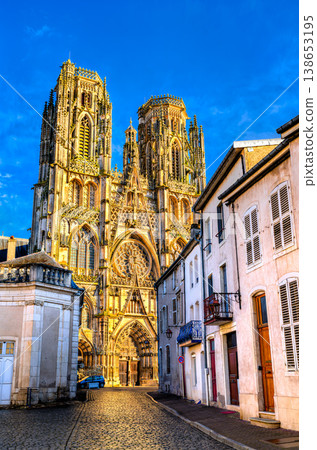 Scenic view of the ornate gothic facade and towers of Saint Stephen Cathedral along a cobblestone street in Toul, Meurthe-et-Moselle, France 138653195