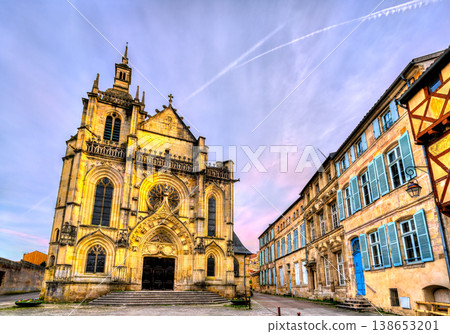 A view of the Flamboyant Gothic facade of Saint Etienne Collegiate Church and historical buildings with blue shutters in Bar-le-Duc, France A view of the Flamboyant Gothic facade of Saint Etienne Collegiate Church and historical buildings with blue shutters in Bar-le-Duc, France 138653201