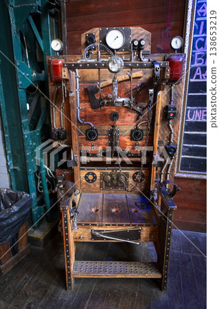 Rustic wooden chair chained electric chair 138653219