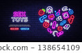 Colorful neon composition with adult accessories icons forming a glowing circle on a brick wall. Stylish vector design for erotic boutique advertising or website header. 138654109