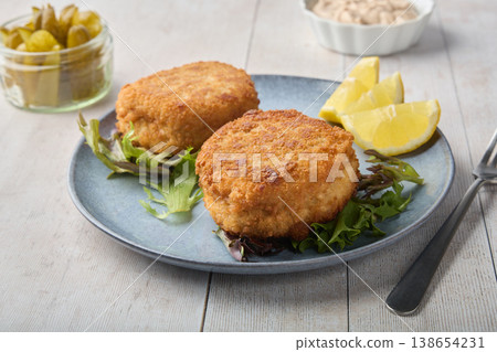 Crispy Breaded Cutlets with Lemon and Fresh Salad Crispy Breaded Cutlets with Lemon and Fresh Salad 138654231