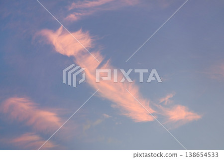 Pink sunset cirrus clouds on evening sky Pink sunset cirrus clouds on evening sky 138654533