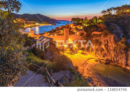 Night view of fortified old town and bay in Tossa de Mar, Spain 138654740